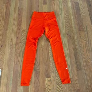 Orange Nike leggings